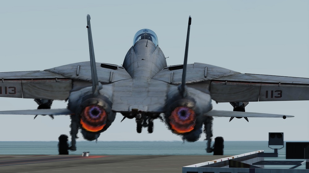 F-14 taking off from an aircraft carrier